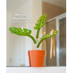 Mirror Monstera – A stylish, wall-mounted bathroom organizer with leaf-shaped holders for rings, toothbrushes, soap, and more. Saves counter space and mounts easily to a mirror.